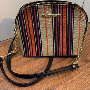 Steve Madden crossbody. Black back, interior & strap. Multicolor striped front